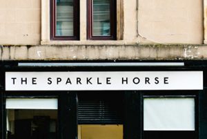 Exterior view of the Sparkle Horse sign